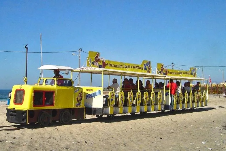 costa-caparica-beach-train_edit_92750465223346.jpg